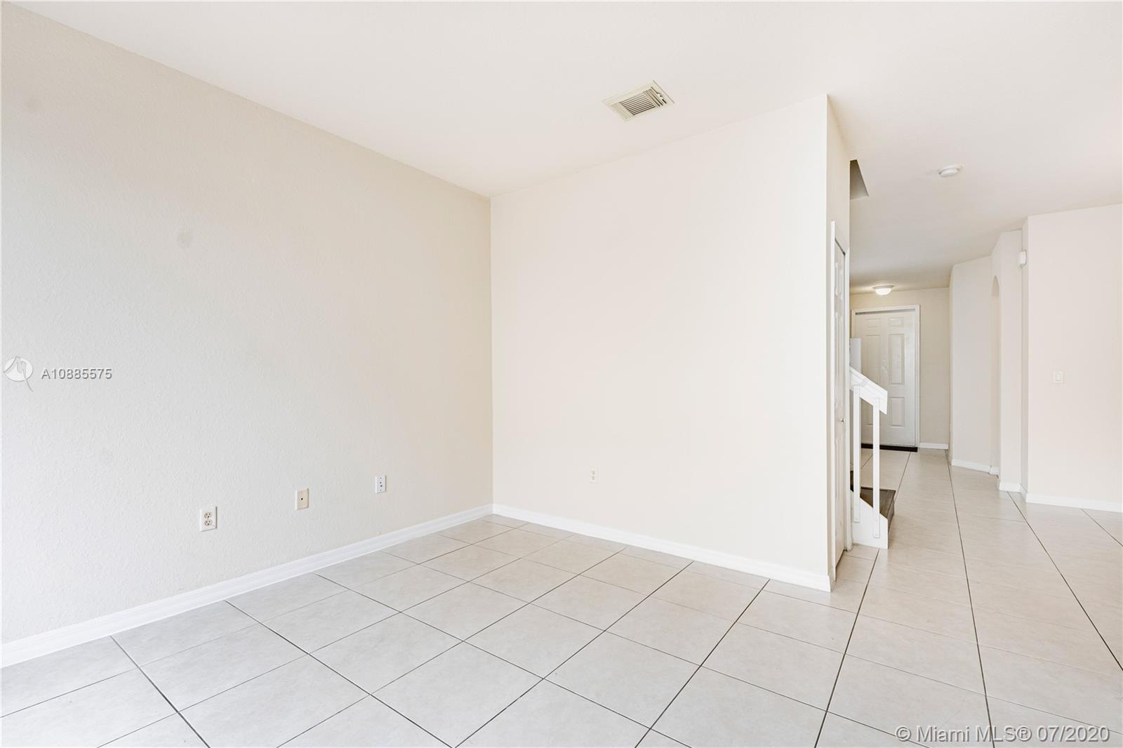 11926 Southwest 152nd Place Miami, FL 33196 - Photo 11 of 48 a view of an empty room