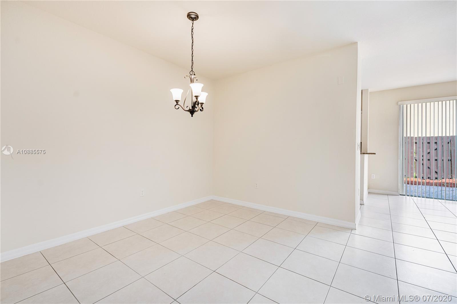 11926 Southwest 152nd Place Miami, FL 33196 - Photo 12 of 48 a view of a room with windows