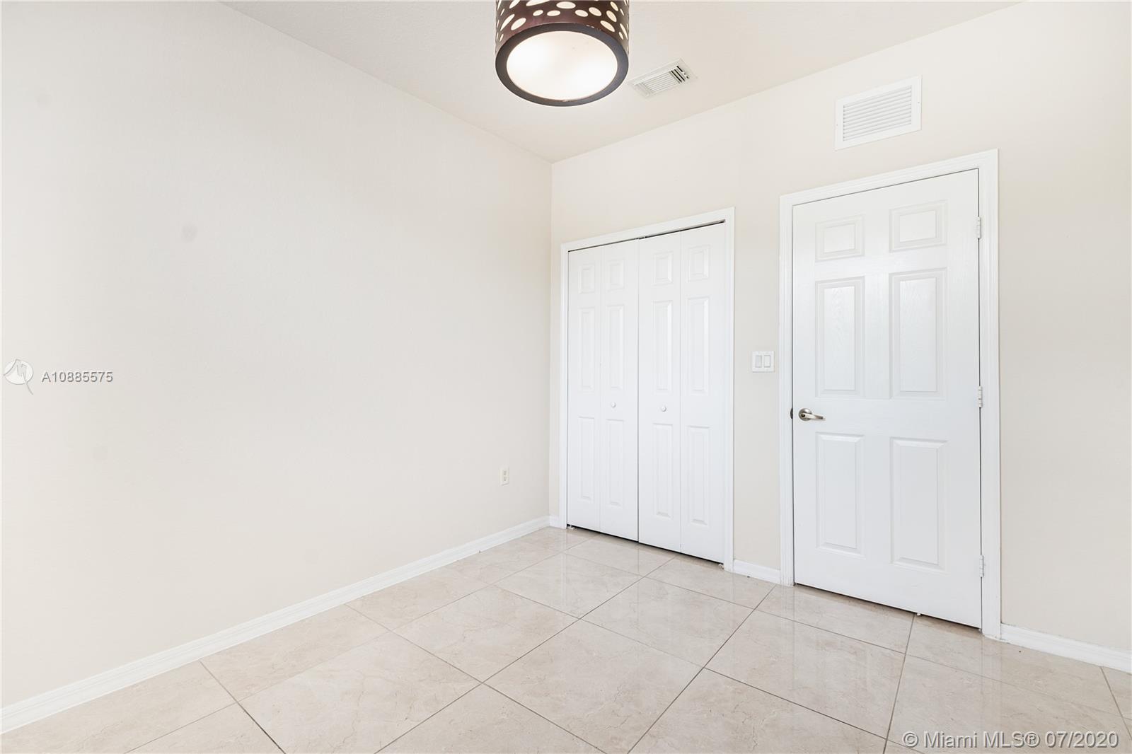 11926 Southwest 152nd Place Miami, FL 33196 - Photo 22 of 48 a view of empty room