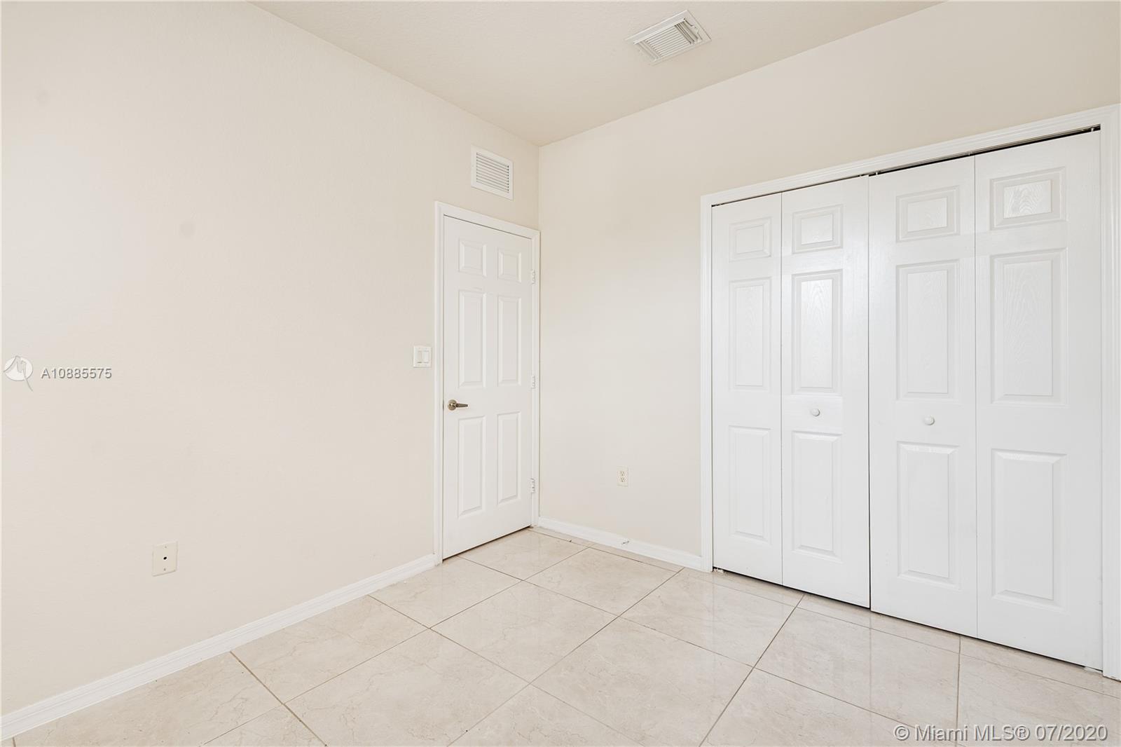 11926 Southwest 152nd Place Miami, FL 33196 - Photo 23 of 48 a view of an empty room
