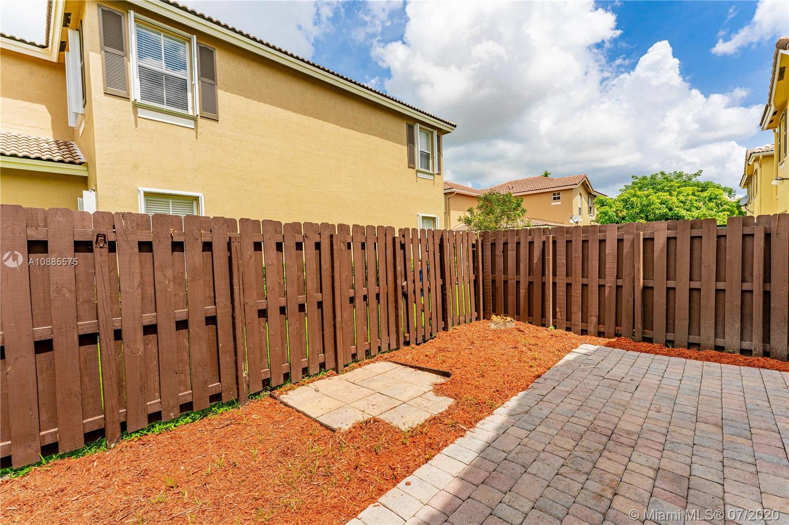 11926 Southwest 152nd Place Miami, FL 33196 - Photo 36 of 48 a view of a wooden fence