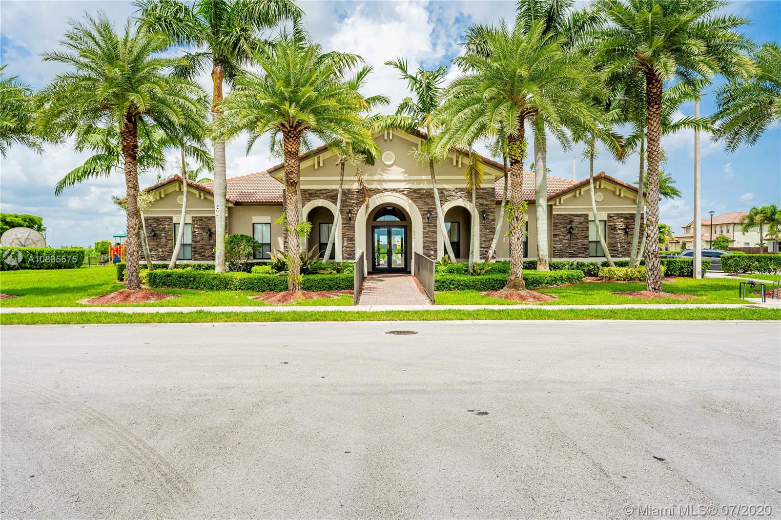 11926 Southwest 152nd Place Miami, FL 33196 - Photo 37 of 48 a front view of a house with swimming pool and yard