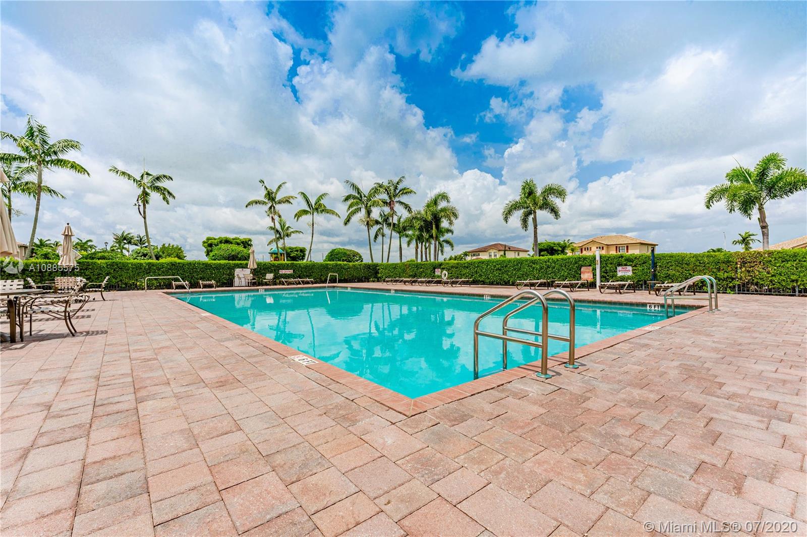 11926 Southwest 152nd Place Miami, FL 33196 - Photo 39 of 48 a view of a swimming pool and outdoor space