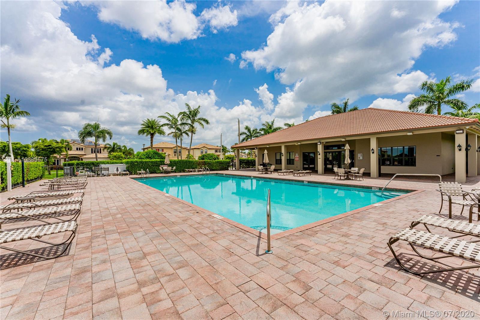 11926 Southwest 152nd Place Miami, FL 33196 - Photo 41 of 48 a view of a house with swimming pool and sitting area