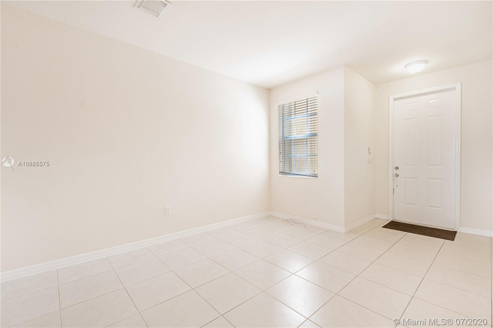 11926 Southwest 152nd Place Miami, FL 33196 - Photo 7 of 48 a view of an empty room