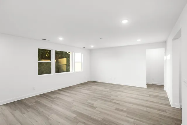 an empty room with windows