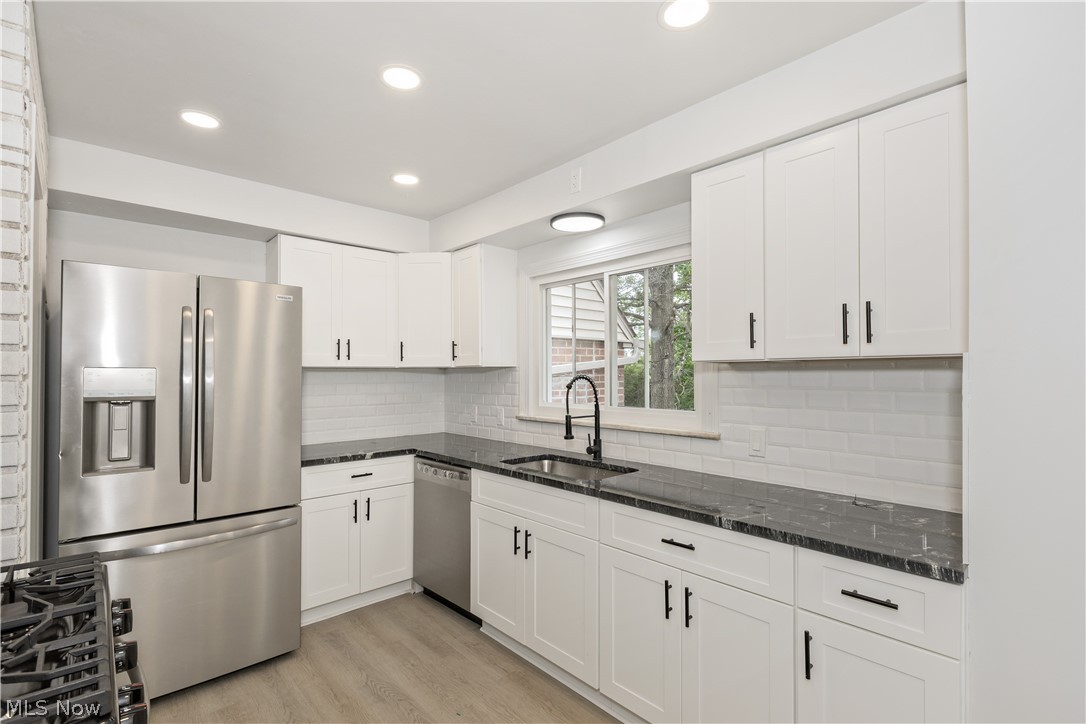 17917 McCracken Road Maple Heights, OH 44137 - Photo 12 of 48 Fully renovated kitchen - granite countertops - SS appliances