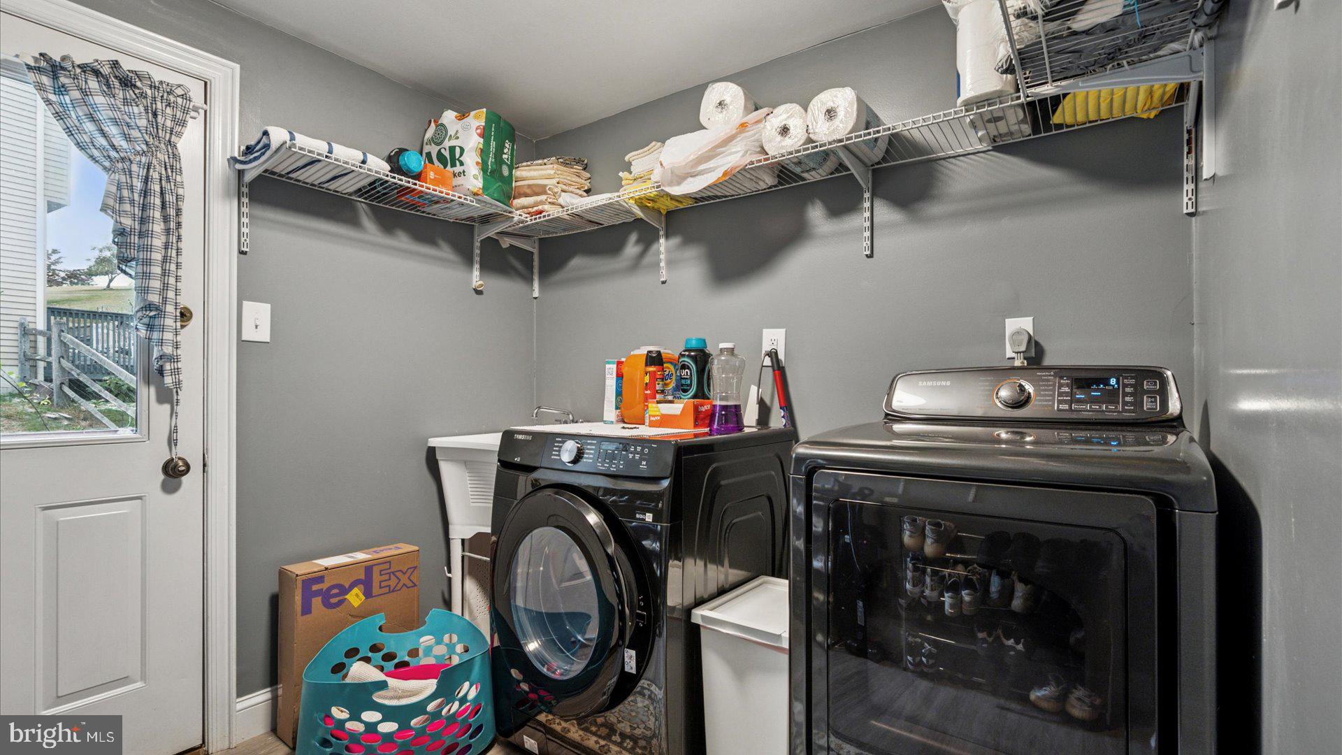 415 Fox Hollow Drive Feasterville-Trevose, PA 19053 - Photo 12 of 26 a utility room with dryer and washer