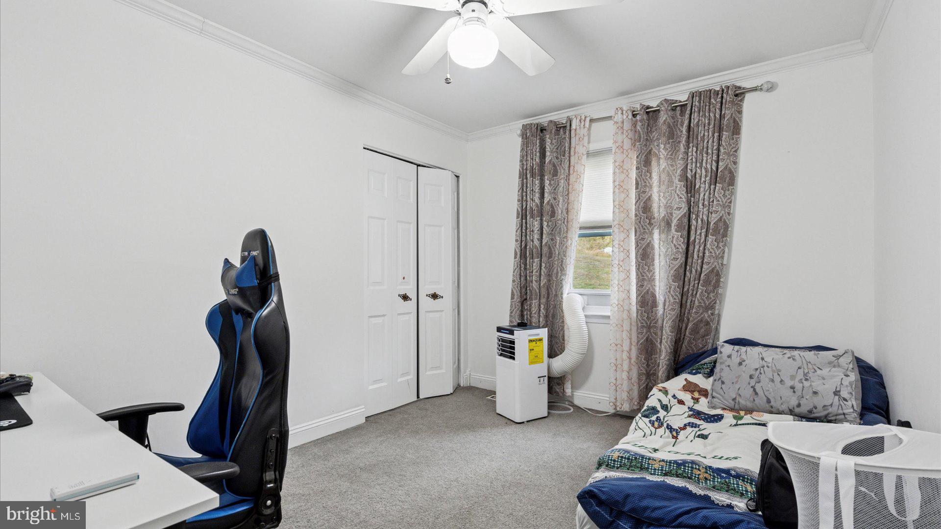 415 Fox Hollow Drive Feasterville-Trevose, PA 19053 - Photo 19 of 26 a living room with furniture and a window