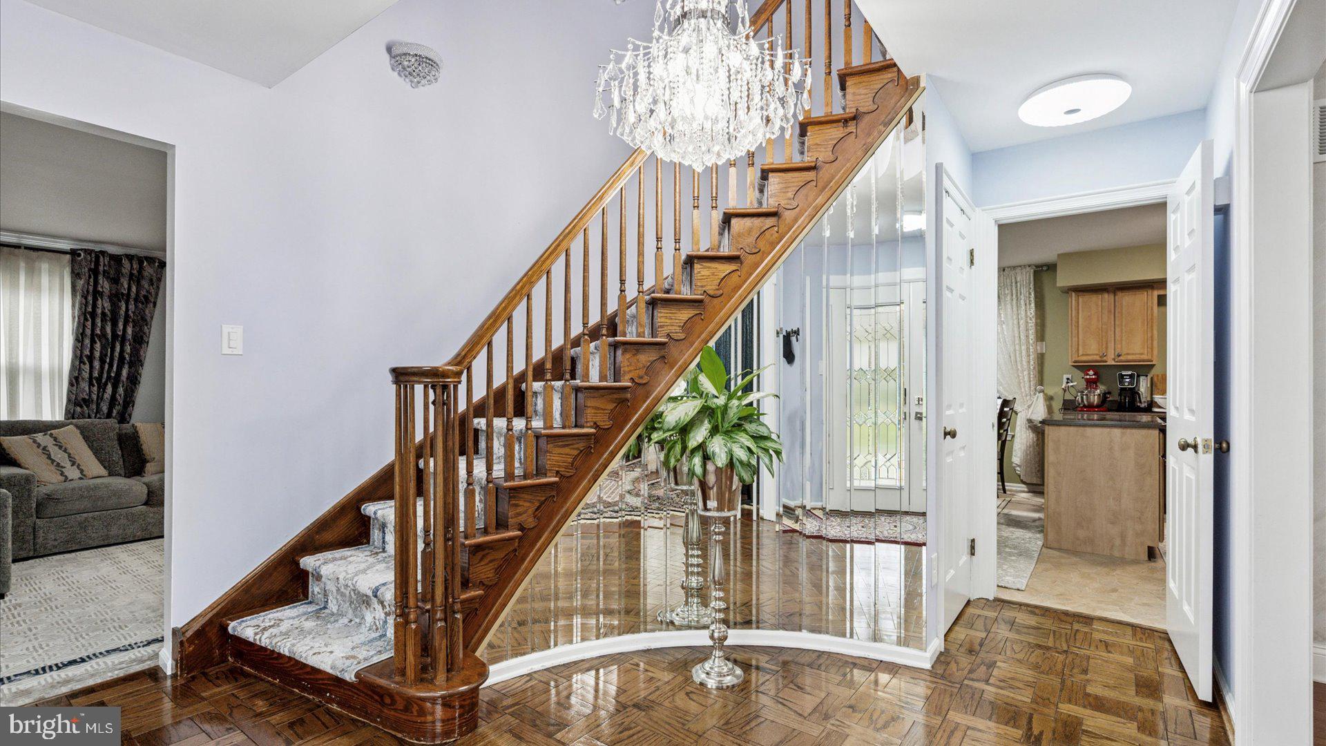 415 Fox Hollow Drive Feasterville-Trevose, PA 19053 - Photo 3 of 26 a view of entryway and hall with wooden floor and a livingroom view