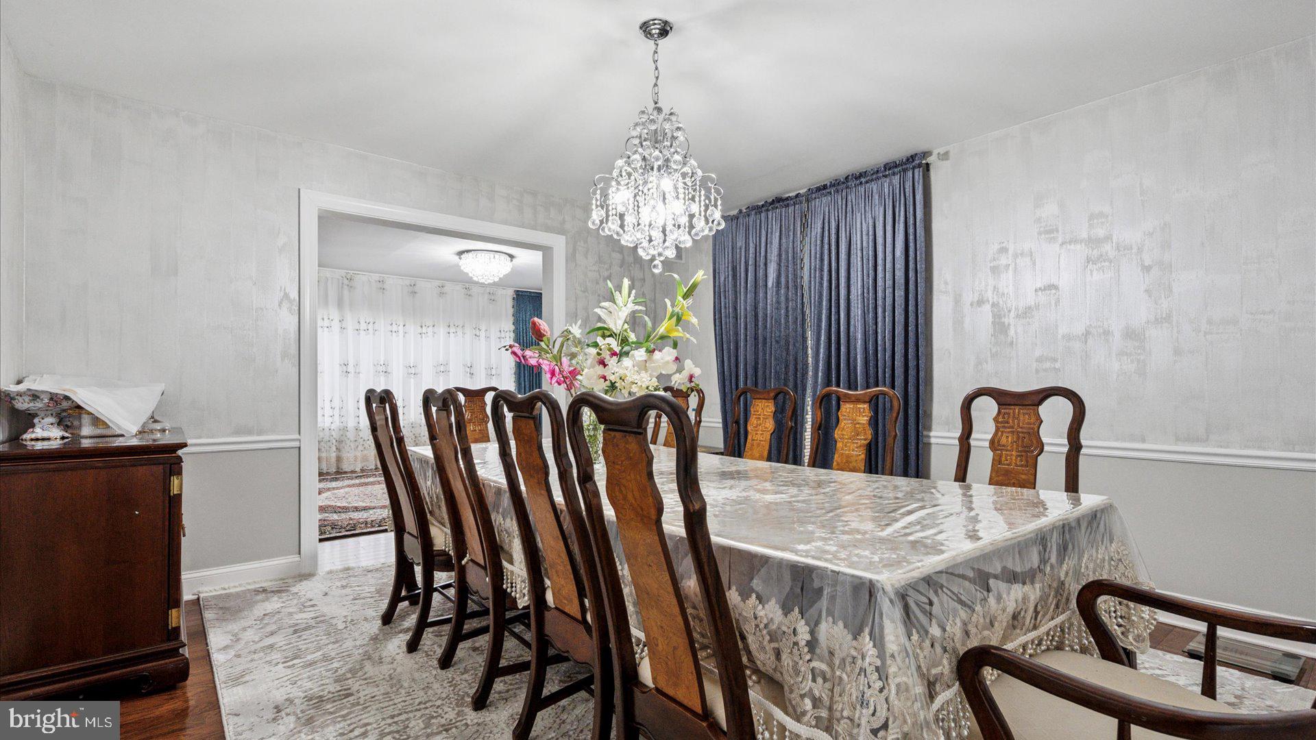 415 Fox Hollow Drive Feasterville-Trevose, PA 19053 - Photo 5 of 26 a view of a dining room with furniture and chandelier