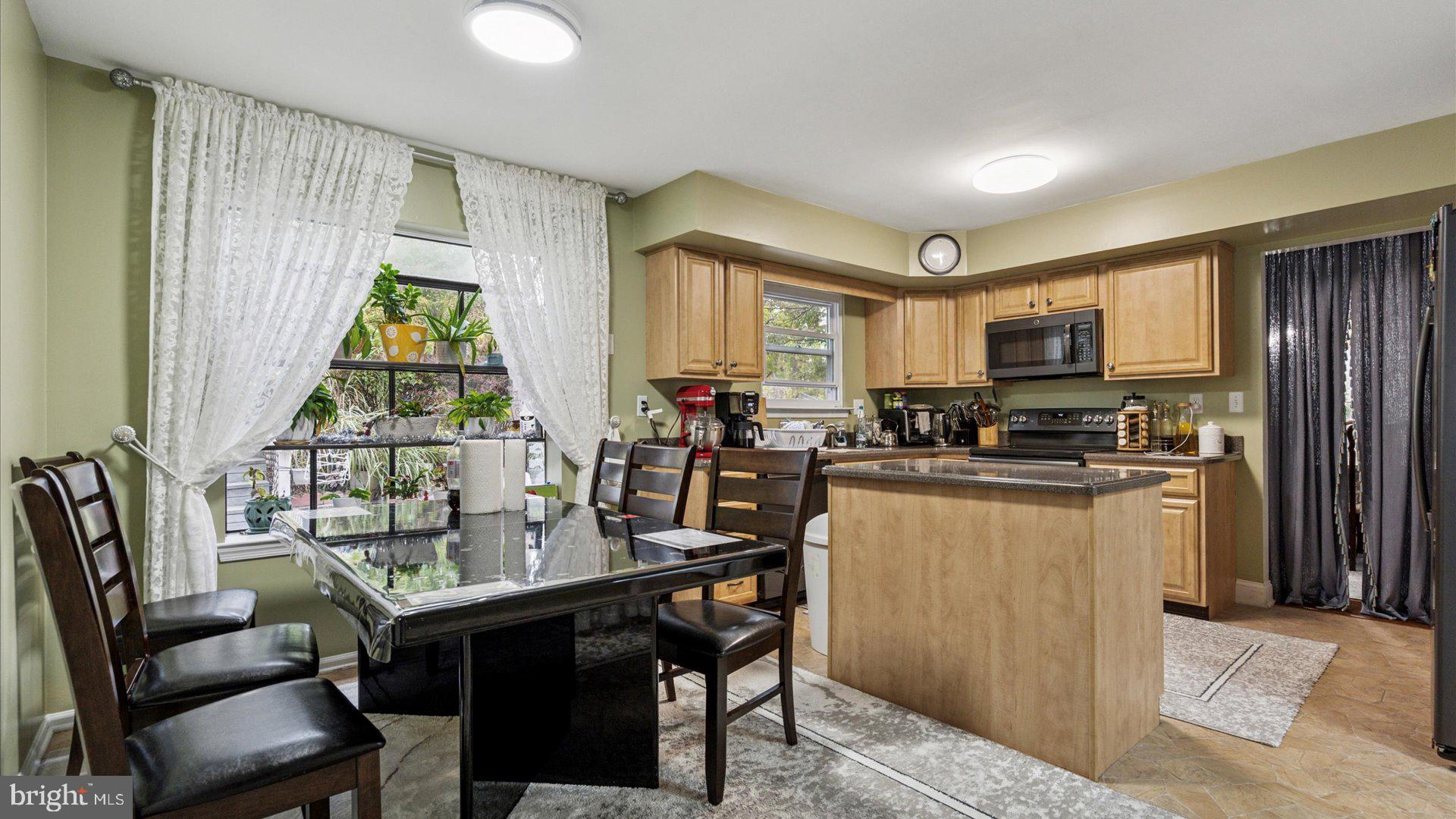 415 Fox Hollow Drive Feasterville-Trevose, PA 19053 - Photo 8 of 26 a very nice looking kitchen with a large window