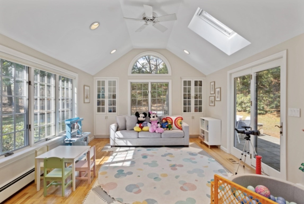 4 Kitson Park Drive Lexington, MA 02421 - Photo 13 of 38 a living room with furniture and large windows