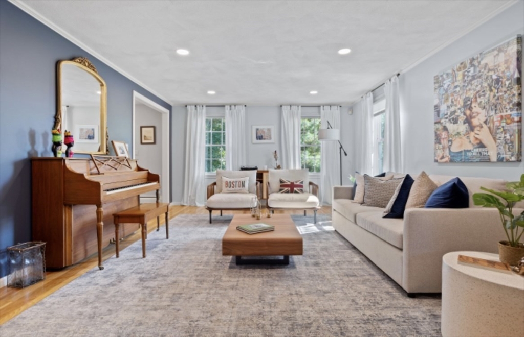 4 Kitson Park Drive Lexington, MA 02421 - Photo 14 of 38 a living room with furniture and a flat screen tv