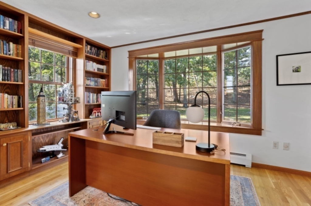 4 Kitson Park Drive Lexington, MA 02421 - Photo 16 of 38 a dining room with furniture and large windows