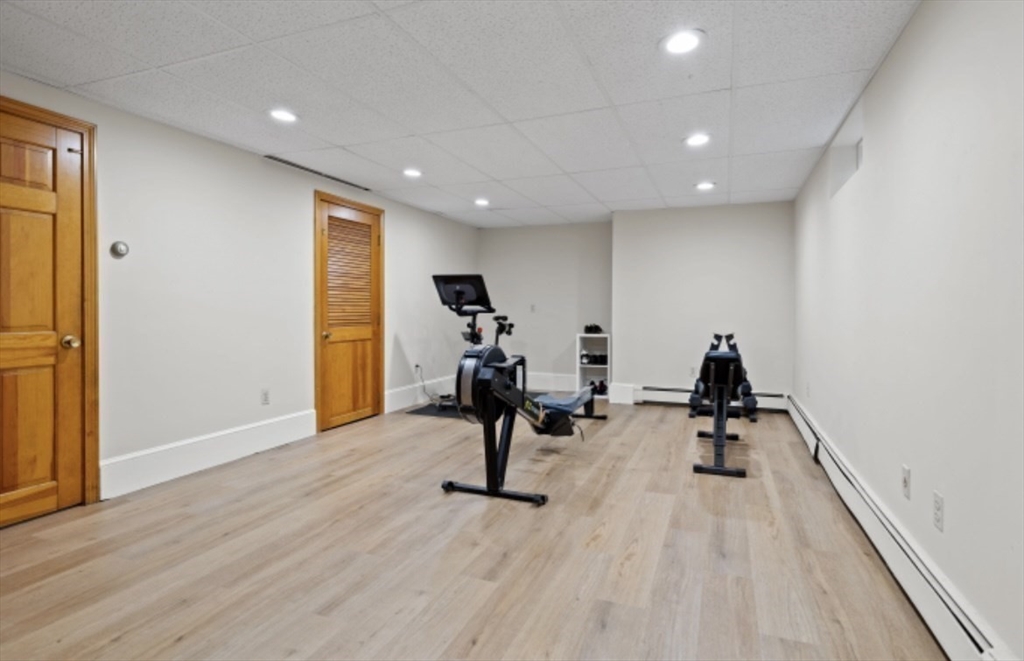 4 Kitson Park Drive Lexington, MA 02421 - Photo 30 of 38 a view of a room with gym equipment