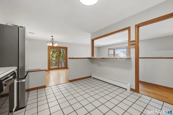 a view of an empty room and window