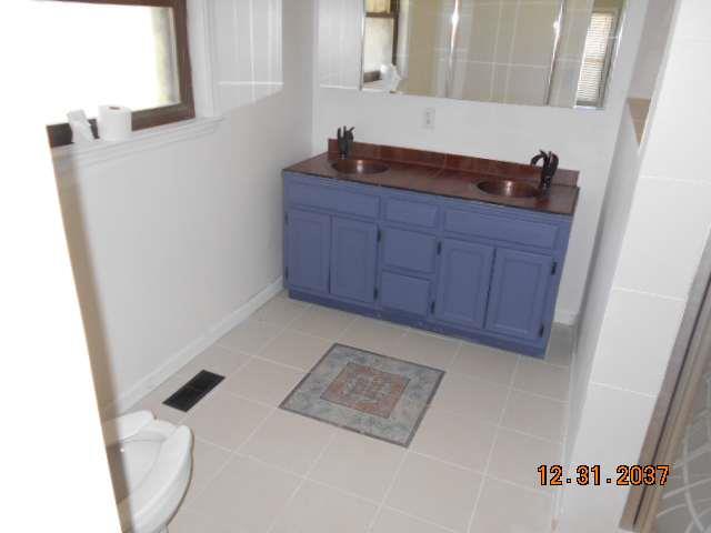 600 Murfreesboro Street Murfreesboro, TN 37127 - Photo 15 of 27 a room with a sink and cabinets