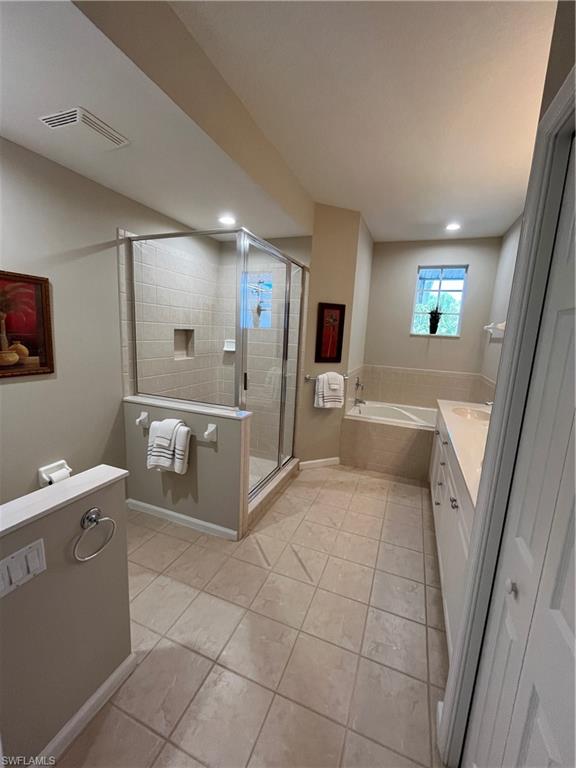 6809 Ascot Drive, Unit 202 Naples, FL 34113 - Photo 12 of 38 a large white room with a large window