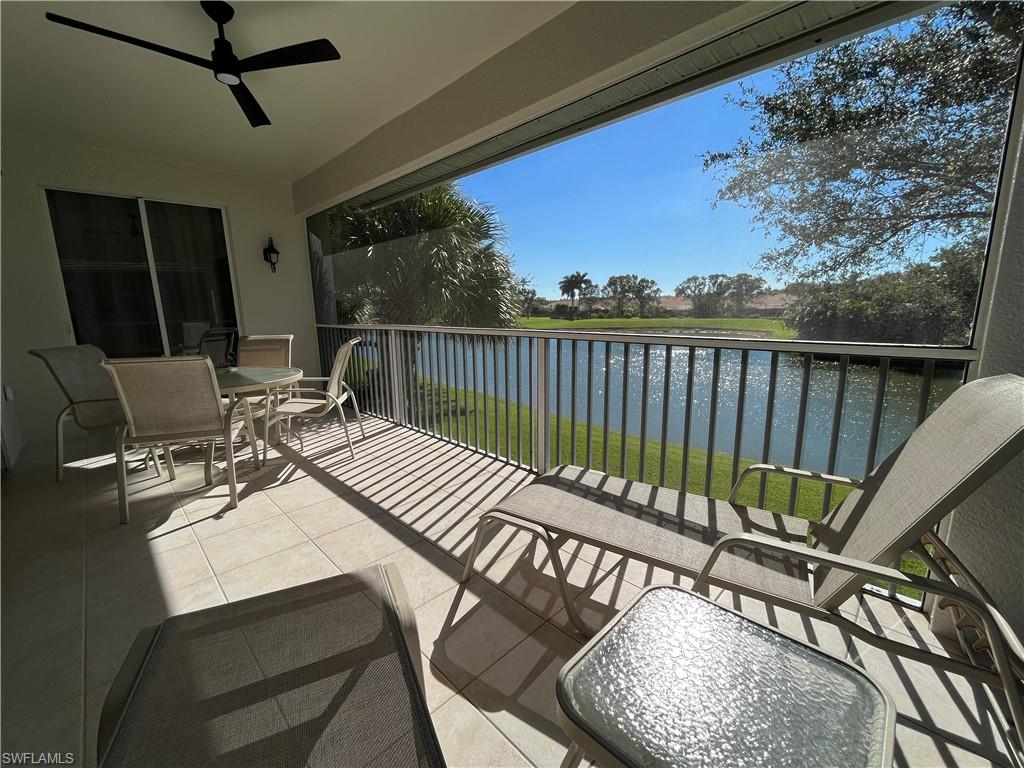 6809 Ascot Drive, Unit 202 Naples, FL 34113 - Photo 20 of 38 a view of a balcony with furniture
