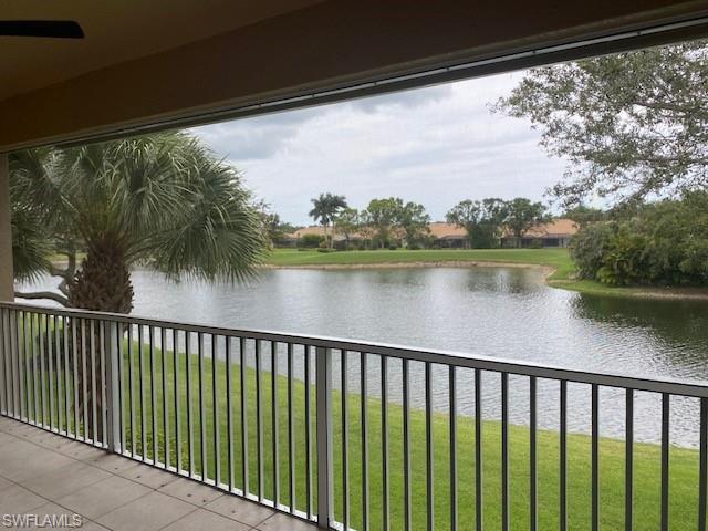 6809 Ascot Drive, Unit 202 Naples, FL 34113 - Photo 3 of 38 a city view from a balcony