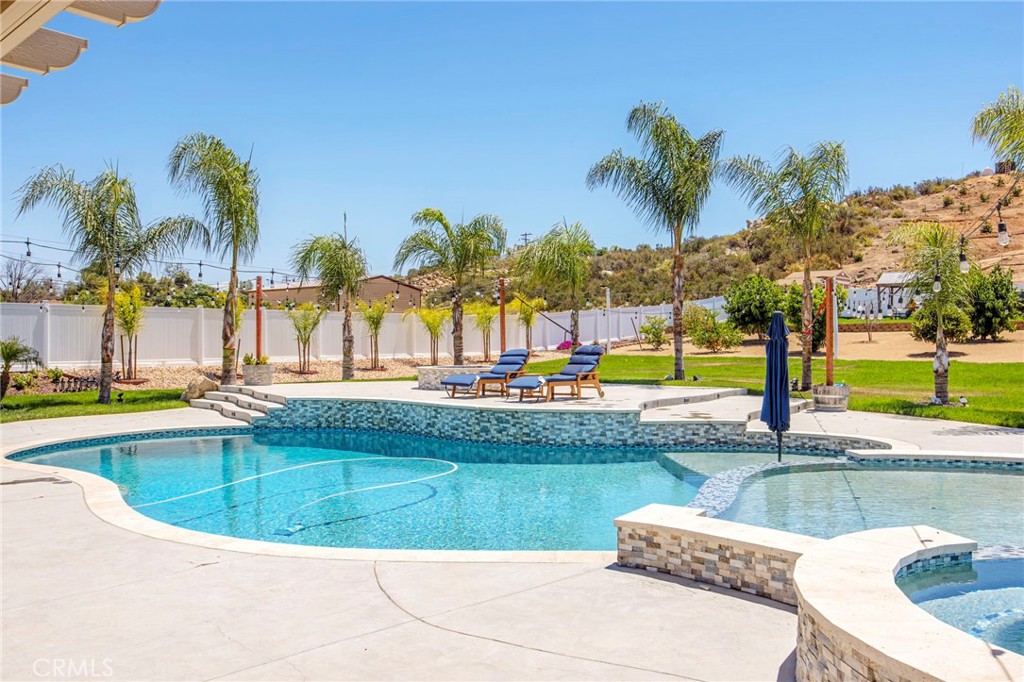 32797 Hayden Road Menifee, CA 92584 - Photo 31 of 51 a view of swimming pool with outdoor seating and yard