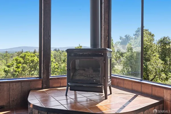 a view of balcony with furniture