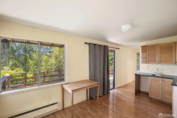a view of an empty room with a window