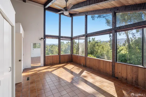 a view of a room with a sink and a window