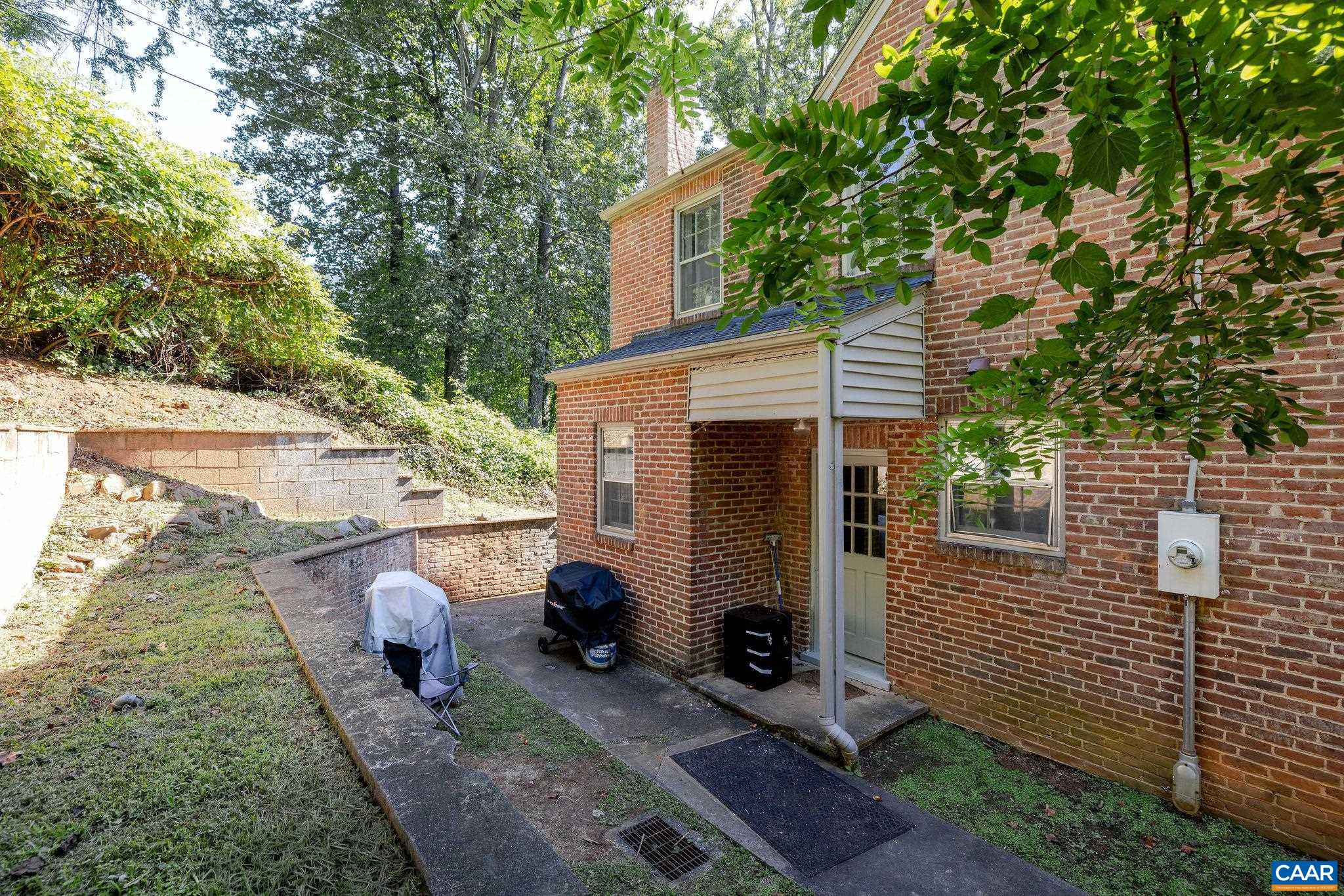 505 Valley Road Charlottesville, VA 22903 - Photo 13 of 29 a view of a house with backyard and a tree
