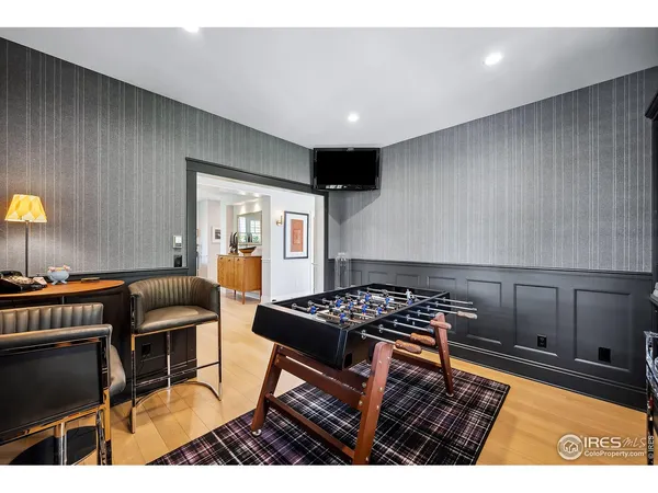 a kitchen with a table and chairs in it