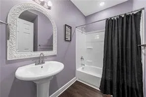a bathroom with a sink and a mirror