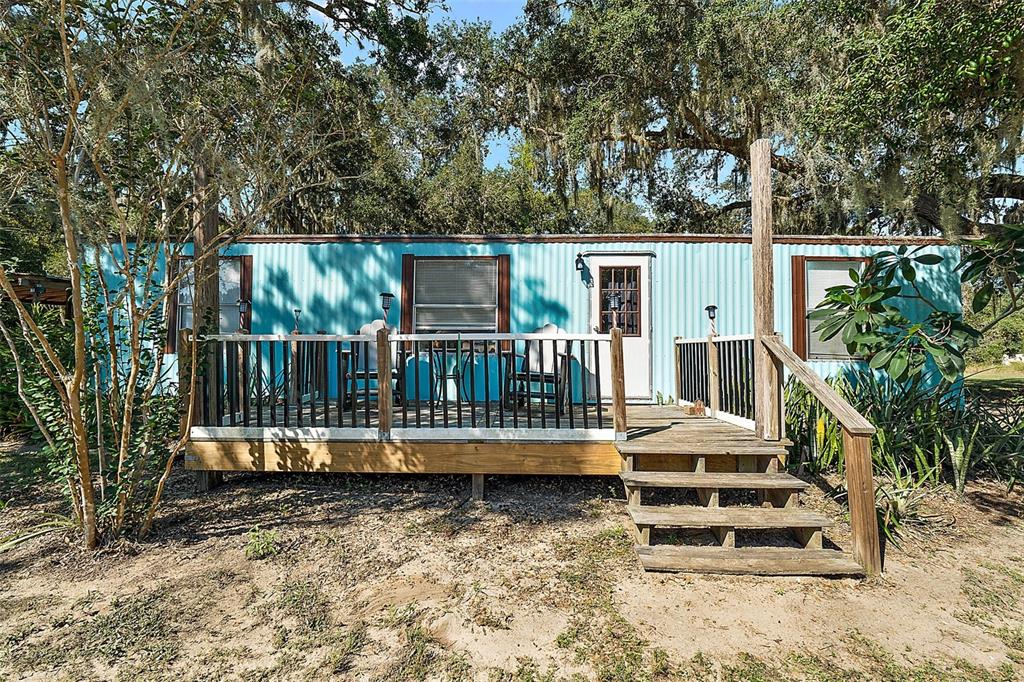 11001 Moon Crest Lane Leesburg, FL 34788 - Photo 2 of 25 a view of a house with a yard