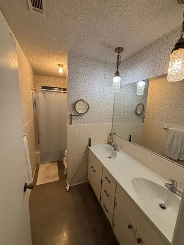 $4,250 | 7506 Downridge Drive, Austin, TX 78731