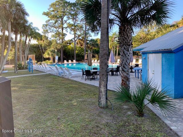235 Capron Road Cocoa, FL 32927 - Photo 19 of 19 a view of outdoor space with trees
