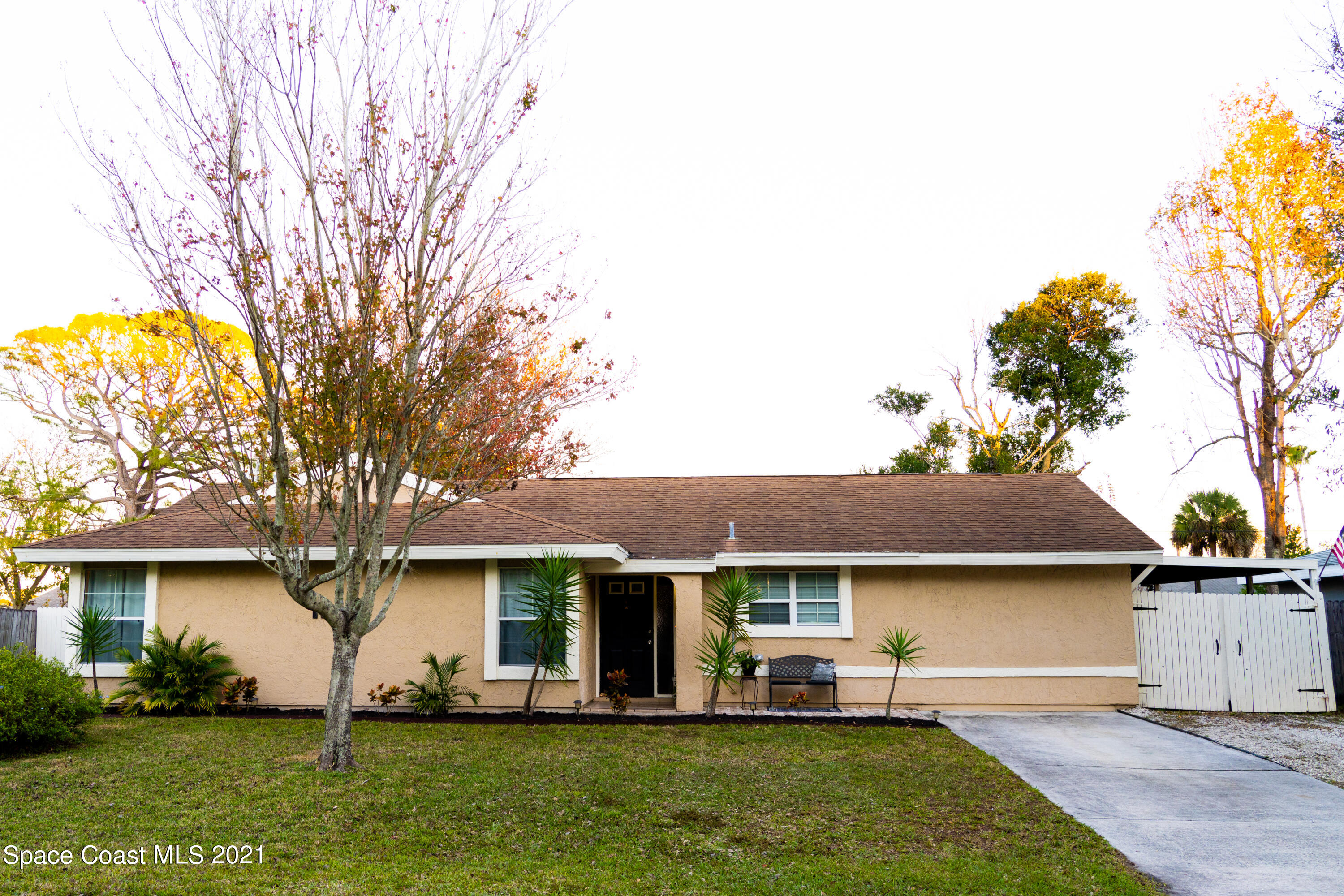235 Capron Road Cocoa, FL 32927 - Photo 3 of 19 a front view of house with yard and green space