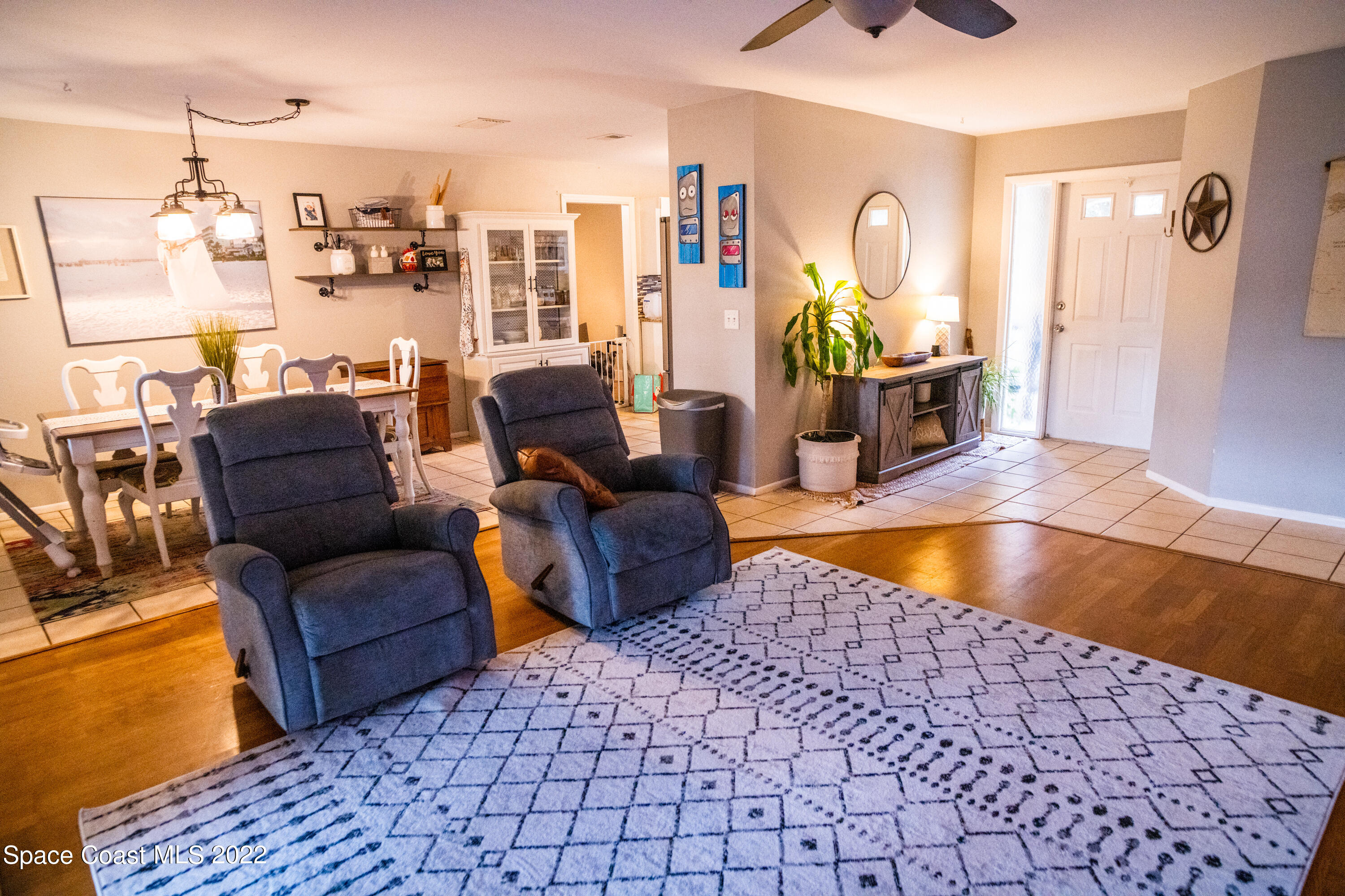 235 Capron Road Cocoa, FL 32927 - Photo 5 of 19 a living room with furniture rug and window