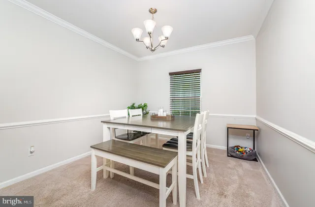 a view of a livingroom with furniture and a fireplace