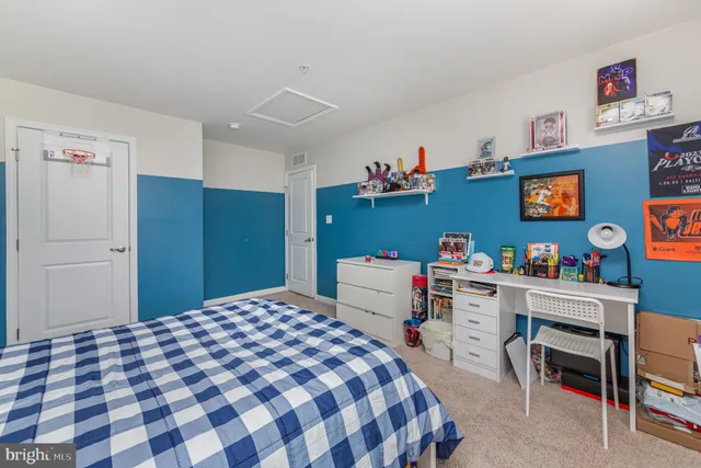 a view of a livingroom with furniture and a window