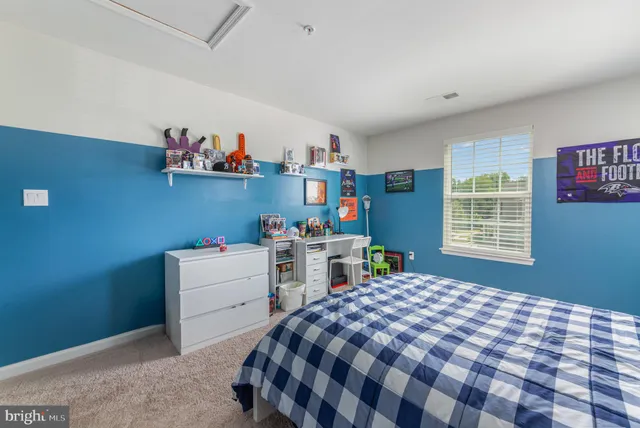 a view of livingroom with furniture and a window