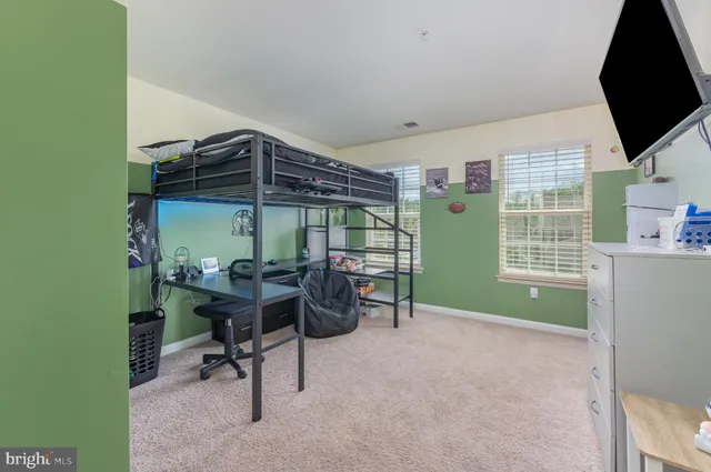 a room with toys and a flat screen tv