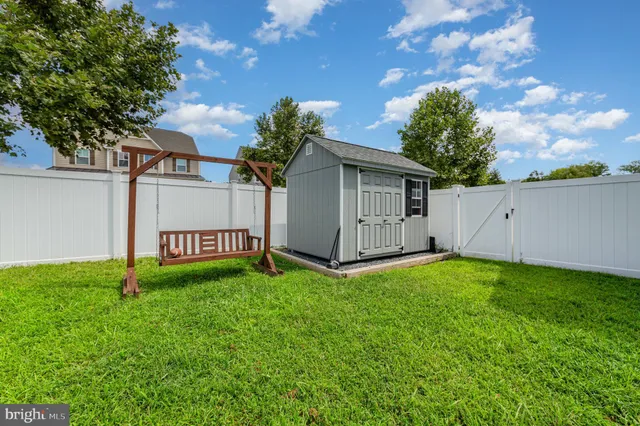 a view of a backyard with a garden