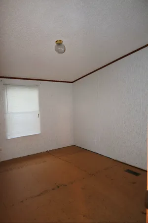 a view of a refrigerator in a room