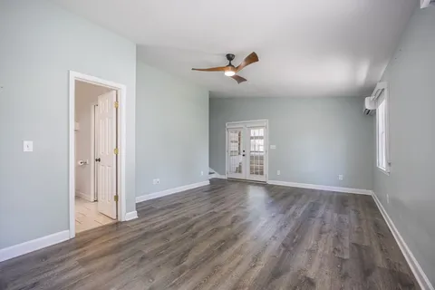 a bathroom with a toilet sink and shower