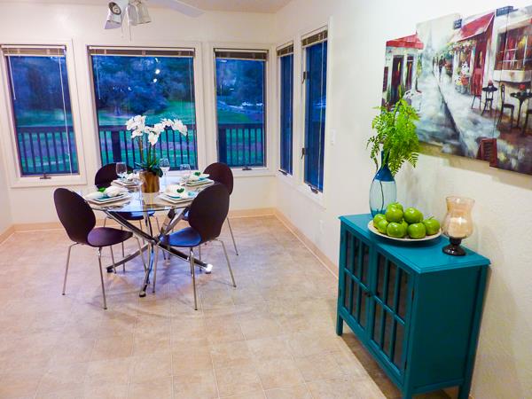 17080 Copper Hill Drive Morgan Hill, CA 95037 - Photo 20 of 38 a dining room with furniture and a potted plant