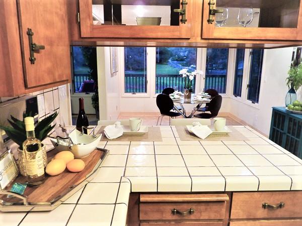 17080 Copper Hill Drive Morgan Hill, CA 95037 - Photo 23 of 38 a view of a lobby with a couch and a potted plant