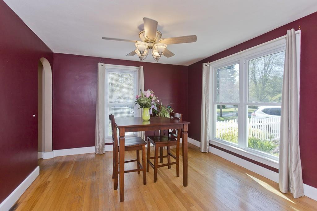 38 Pine Acre Road Springfield, MA 01129 - Photo 13 of 40 a dining room with furniture a large window and wooden floor