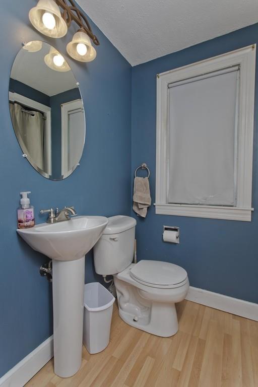 38 Pine Acre Road Springfield, MA 01129 - Photo 14 of 40 a bathroom with a toilet a sink and mirror