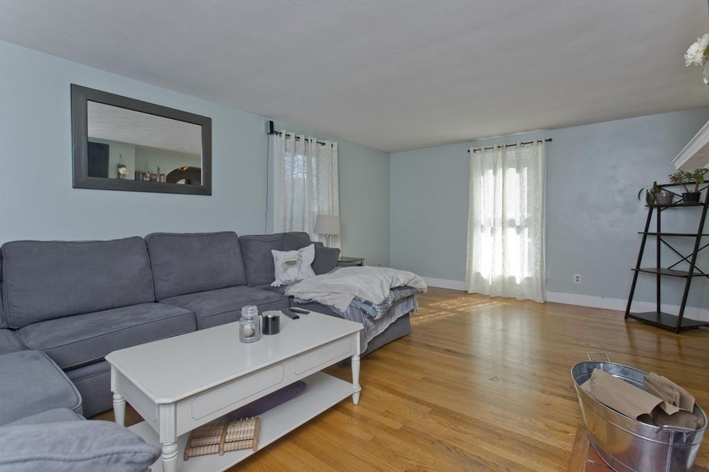 38 Pine Acre Road Springfield, MA 01129 - Photo 15 of 40 a living room with furniture and a wooden floor
