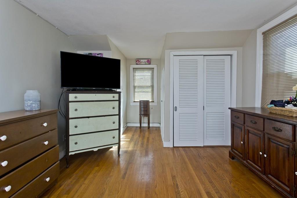 38 Pine Acre Road Springfield, MA 01129 - Photo 23 of 40 a room with furniture and flat screen tv